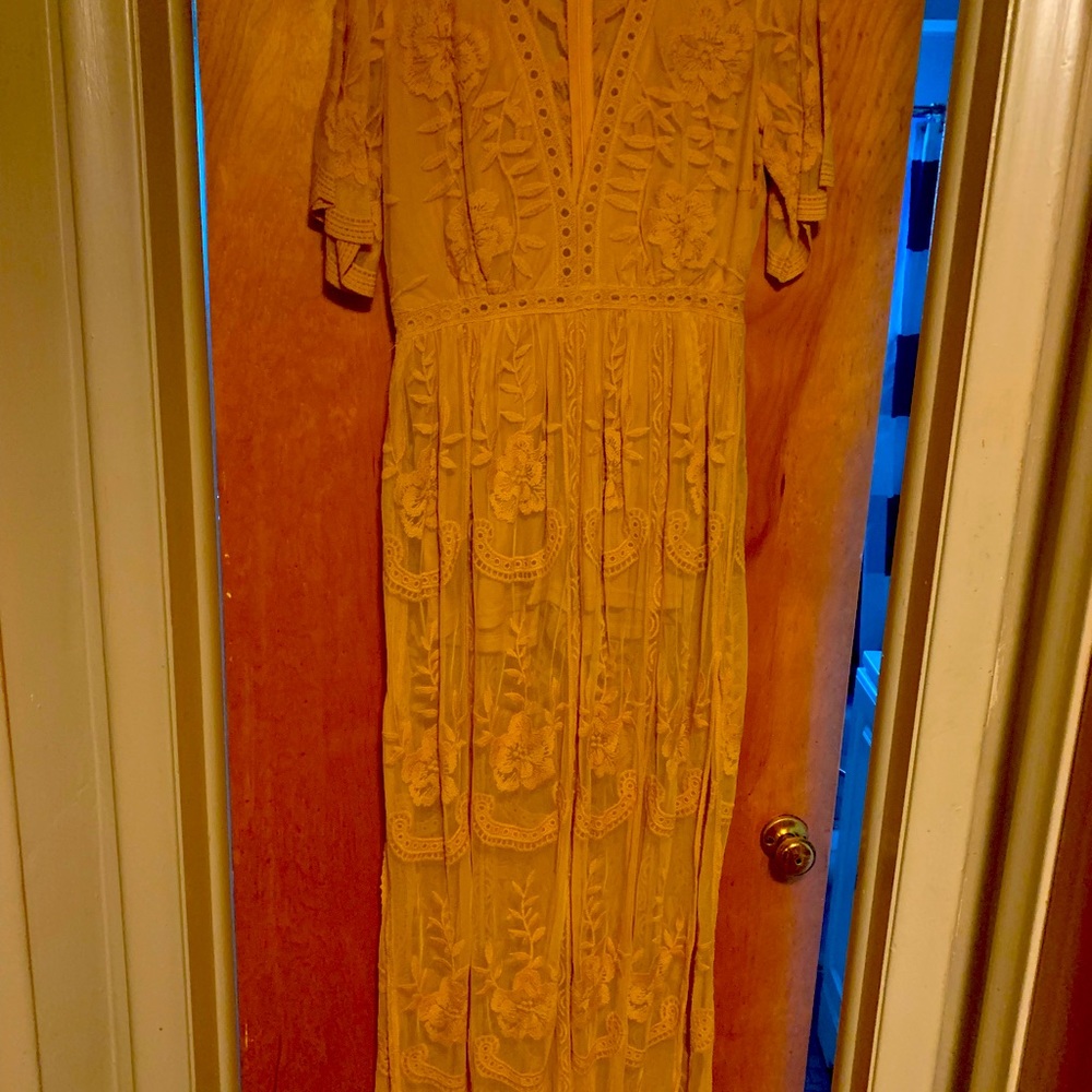 Yellow lace dress split both size. Never worn